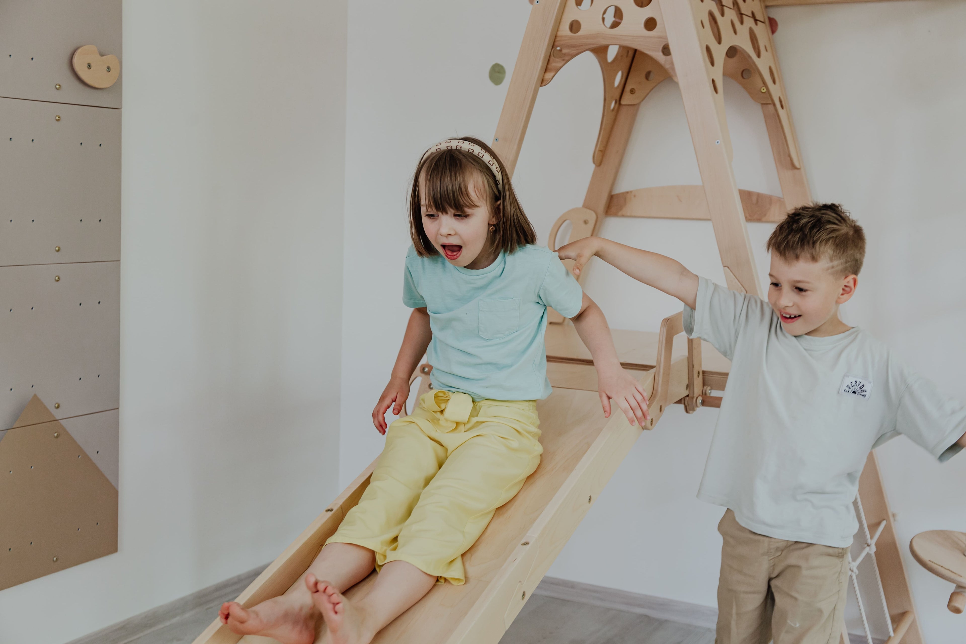 The Benefits of Playground Slides for Home Playrooms